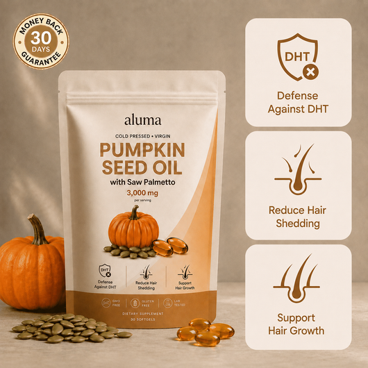 Aluma Pumpkin Seed Oil dietary supplement pouch shown on a beige background with decorative pumpkins, loose seeds, and three benefit callout panels. The package reads 'Pumpkin Seed Oil with Saw Palmetto 3,000 mg' and includes icons for DHT defense, reduced hair shedding, and hair growth support.